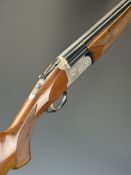 Bettinsoli 12 bore over and under ejector shotgun with engraved scenes of birds to the locks and