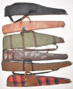 Six shotgun or rifle slips including G T Shooting and a tartan example. gg