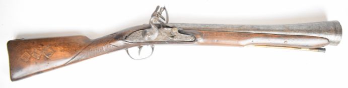 Unnamed flintlock blunderbuss with chequered grip, metal tipped wooden ram-rod and engraved lock,