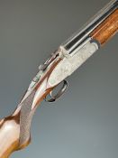 Rizzini 12 bore over and under shotgun with engraved scenes of ducks and pheasants to the sidelock