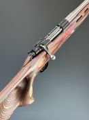 Mauser 98 Safari Super 5.6x57 bolt-action rifle with laminated show wood stcok, thumb-hole grip,