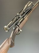 Sako 85 S .243 bolt-action rifle with chequered semi-pistol grip and forend, raised cheek piece,