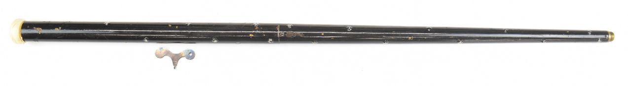 Unnamed metal walking cane air gun with turned ivory handle, blackthorn effect shaft, alignment