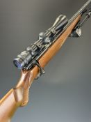 Krico .22 bolt-action rifle with chequered semi-pistol grip and forend, raised cheek piece, sling