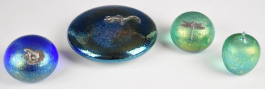Four Heron Glass iridescent glass paperweights, including one with applied lizard, one with