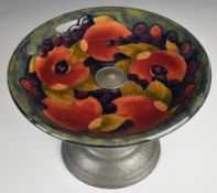William Moorcroft tazza decorated in the Pomegranate pattern, with pewter mount, the base signed and