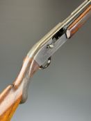 Browning 12 bore 2-shot semi-automatic shotgun with engraved action, chequered semi-pistol grip