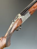 Miroku 12 bore over and under ejector shotgun with engraved lock, underside, trigger guard and thumb
