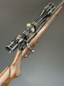 BRNO 527 .222 bolt-action rifle with chequered semi-pistol grip and forend, raised cheek piece,
