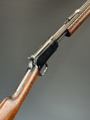 Winchester Model 62A .22 pump-action rifle with adjustable sights and 23 inch barrel, overall length
