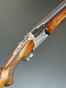 Nikko Shadow Indy 12 bore over and under ejector shotgun with engraved locks, trigger guard,