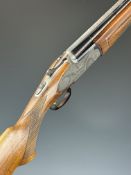 Rizzini 12 bore over and under ejector shotgun with engraved sidelock plates, underside, trigger