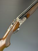 Lanber 12 bore over and under ejector shotgun with engraved scenes of birds to the locks and