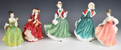 Five Royal Doulton figurines including Fair Lady, Top O' the Hill, Christmas 2000, etc, tallest