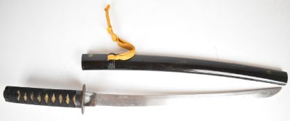 Japanese Wakizashi Samurai sword with bound shagreen grip, gilt and embossed tsuba decorated with an