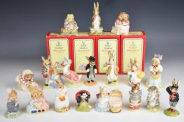 Eighteen Beswick, Royal Albert, Royal Doulton, Beatrix Potter and Bunnykins figures, tallest 13cm.