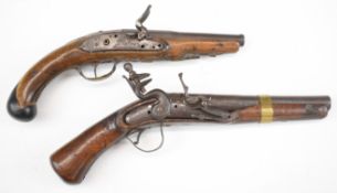 Two flintlock pistols one with engraved lock, brass trigger guard and carved decoration, the other