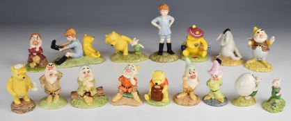 Royal Doulton Winne the Pooh and Snow White and the Seven Dwarfs figures, tallest 12cm