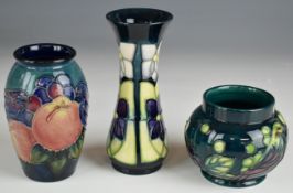 Three Moorcroft vases including one decorated in the Finches pattern, tallest 13cm