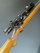 Browning T-bolt .22 straight-pull bolt-action rifle with chequered semi-pistol grip and forend,