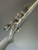 CZ 452-2E ZKM .22 bolt-action rifle with composite stock, semi-pistol grip, raised cheek piece,