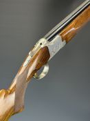 Browning B2 12 bore over and under ejector shotgun with engraved scenes of birds to the locks and
