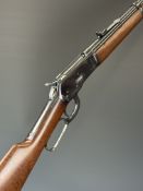 Rossi .38/ .357 underlever-action repeating carbine rifle with tiger plaque inset to the action,