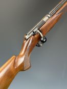 Anschutz Model 1517 .17 HMR bolt-action rifle with chequered semi-pistol grip and forend, sling