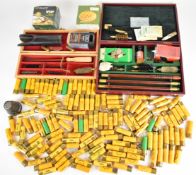 Over two hundred 20 bore shotgun cartridges together with three cleaning kits including one Parker-