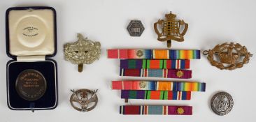 Collection of military badges and ribbons, including British Empire Medal, WW1, WW2, General Service