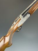 Rizzini 12 bore over and under ejector shotgun with engraved scenes of birds to the sidelock