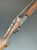 Lanber 12 bore over and under ejector shotgun with engraved locks, underside, trigger guard, top