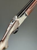 Winchester 101 XTR Lightweight 12 bore over and under ejector shotgun with engraved scenes of