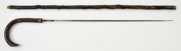Early 20th century hawthorn or similar swordstick with white metal mounts and 58cm square tapering