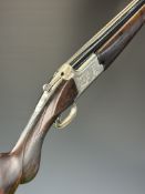 Browning B325 Grade 3 12 bore over and under ejector shotgun with engraved scenes of birds to the