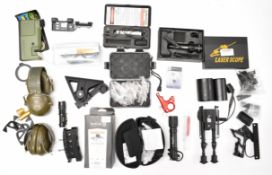 A collection of gun and shooting parts and accessories including bi-pod, ear defenders, Armed Forces