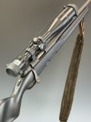 Steyr Mannlicher Safebolt .223 bolt-action rifle with composite stock, semi-pistol grip, leather