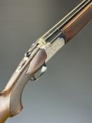 Lanber 12 bore over and under shotgun with engraved locks, underside, trigger guard, top plate and