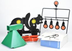 A collection of air rifle targets including Gamo folding squirrel and rat knock down targets, a