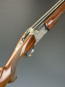 Winchester 101 XTR Lightweight 12 bore over and under ejector shotgun with engraved scenes of