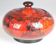 Moorcroft pedestal covered flambé bowl decorated in the Leaf and Berry pattern, H10cm, diameter