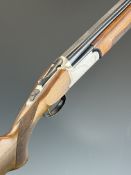Rizzini 12 bore over and under ejector shotgun with border engraved locks, underside, trigger guard,