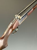 Chieftain 12 bore side by side shotgun with engraved lock, underside, trigger guard, thumb lever and