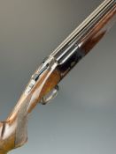 Browning GTI Plus Sporter Ultra 12 bore over and under ejector shotgun with gold inlaid naming to