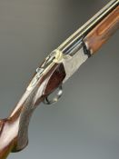 Winchester 101 XTR Lightweight 12 bore over and under ejector shotgun with engraved scenes of