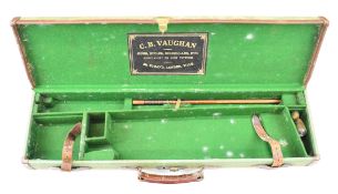 Leather and canvas bound shotgun carry case with fitted interior and 'C.B. Vaughan Guns, Rifles