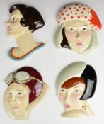 Four Kevin Francis figural wall plaques / face masks comprising of Norma Jean, Faye, Amy Johnson and