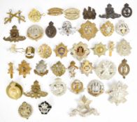 Collection of military cap badges to include Black Watch, the Cameronians, Bermuda Rifles, Liverpool