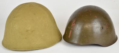 Two European helmets comprising Portuguese WW2 M40 steel helmet with leather liner marked 2224 and