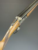 Ugartechea 20 bore side by side ejector shotgun with engraved locks, underside, trigger guard, and